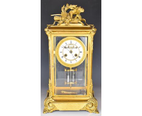 Victorian Henry Marc gilt four glass mantel clock with Brocot escapement, enamel dial, striking on a bell with mercury compen