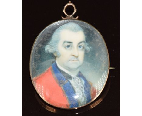 Georgian portrait miniature of a distinguished gentleman in yellow metal setting with heart motif and 'My Bosom Friend' verso