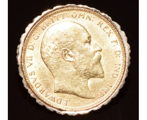 A 9ct gold ring set with a 1910 gold full sovereign, 19g, size R