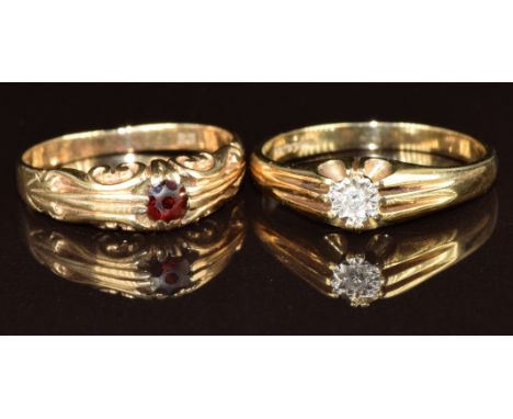Two 9ct gold rings, one set with a diamond and the other a garnet, 5.8g, size R &amp; T
