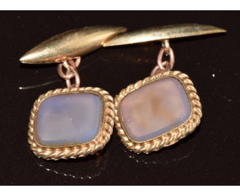 A pair of 9ct gold cufflinks set with blue agate, 6.3g