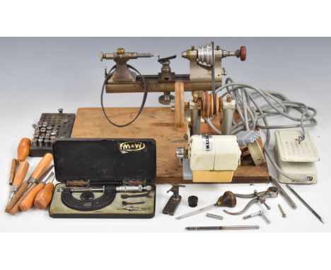 19th or early 20th century watchmaker's lathe with Jones electric motor drive, together with a quantity of collets, turning t