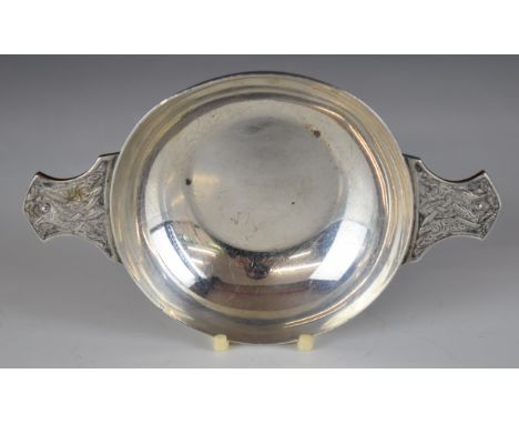 George VI hallmarked silver quaich with Celtic or similar decoration to the handles, London 1945, maker's mark rubbed but als