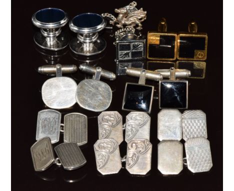 Six pairs of silver cufflinks and one other pair&nbsp;
