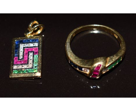 A 14k gold ring set with rubies, emeralds and diamonds (size J) and a 14k gold pendant set with emeralds, rubies and sapphire