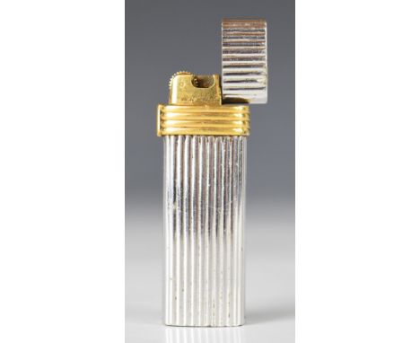 Christian Dior Paris silver and gold plated cigarette lighter with reeded decoration, height 7cm  PLEASE NOTE WE ARE NOT ABLE