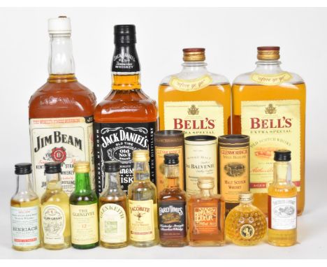 Four bottles of Scotch and Bourbon whiskys comprising Bell's, Jack Daniel's and Jim Beam together with 12 miniatures includin