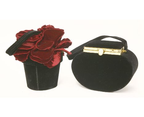 A Lulu Guinness 'rose flower pot' handbag, a black velvet flower pot with red velvet roses to lid, opening to reveal a 'Lulu 