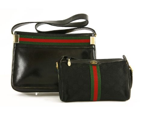 A Gucci vintage black leather handbagwith techno canvas banding and gold-tone hardware, anda Gucci monogrammed canvas and tec