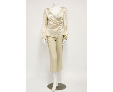 An Armani Collezioni cream silk evening top,with ruched detailing and crystal beading to the front,size IT 40,a pair of Alice