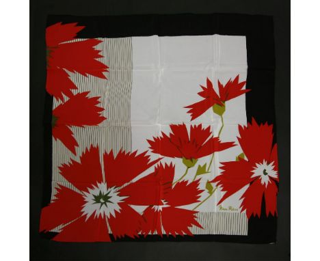 A collection of designer scarves,to include:a Chanel silk scarf, a cream ground with teal border with printed monogram design