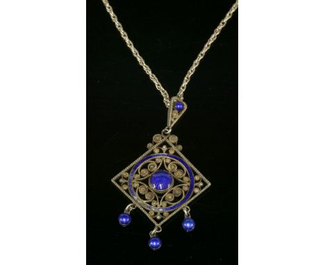 A Norwegian silver and enamel pendant by Marius Hammer of Bergen, c.1905, of offset square form, a central royal blue enamel 