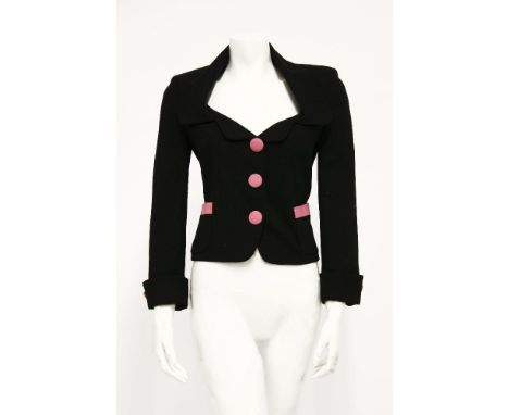 A Maick Harold black velvet evening jacket, c.1980, with large lapel collar and gathered detailing to the back, lined in a si