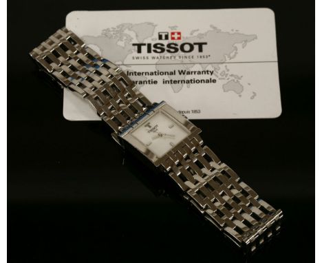 A ladies' stainless steel Tissot quartz bracelet watch,with a small mother-of-pearl dial, with silvered hands, a four-row gat