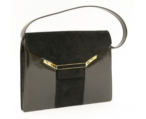 A Christian Dior black leather clutch bag,with white metal clasp and logo engraved 'Dior', stamped 'Christian Dior Made in Fr