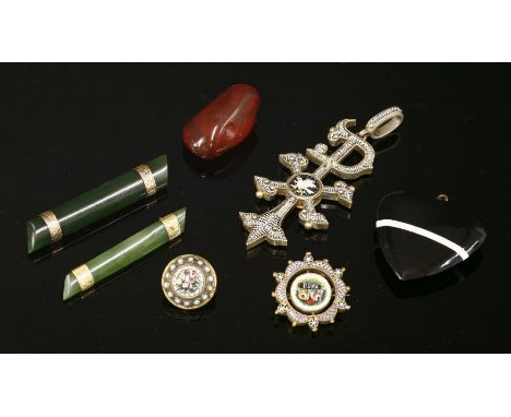 Two gold mounted nephrite bar brooches,with hand engraved bars, one marked 9ct,an Italian micromosaic Chi Rho pendant, losses