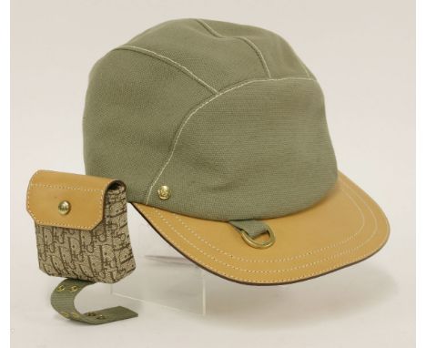 A Christian Dior 'Street Chic' khaki green canvas and tan leather baseball cap,with detachable Dior monogrammed pouch with in