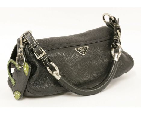 A Prada black grain calfskin leather flap handbag,with enamel triangular Prada logo, smooth leather and silver-tone hard hand