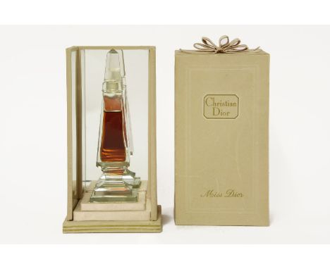 A Christian Dior 'Miss Dior' scent bottle with contents,pyramid shaped bottle and stopper in original 'Miss Dior' box