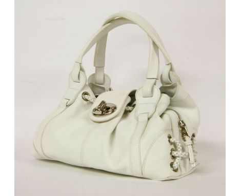 An Escada Sport brown and cream fabric handbag,enamel clasp with 'EE' silver-tone logo and silver-tone hardware with a sectio