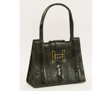 A Lorenzi black ostrich-leg leather handbag,with leather strap closure and 'H' gold tone enamel lock, with leather interior a