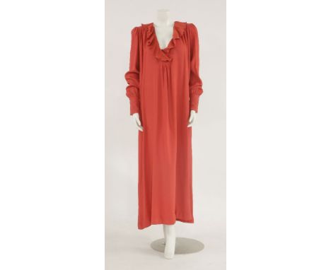 A Zandra Rhodes vintage red dress,c.1970, with fine pleated ruffle neckline and deep button cuff,size M