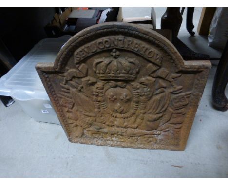 A heavy Victorian cast iron fire back; decorated with a coat of arms