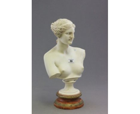 An alabaster bust of a Greek lady