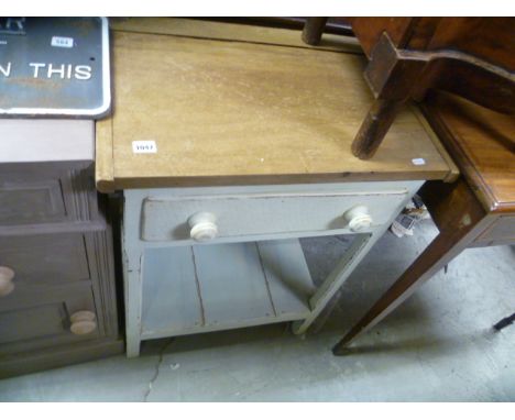 A painted single drawer side table; with turned handles and shelf below