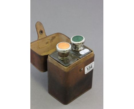 Vintage Set of Two Glass Hunting Flasks with Enamel Set White Metal Lids contained in a Leather Case