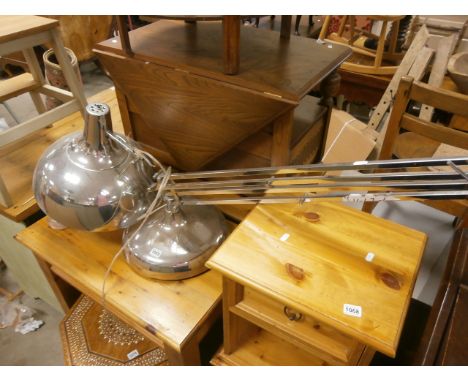 A floor standing chromium anglepoise lamp 