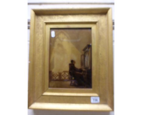 An antique crystoleum of a monk playing an organ
