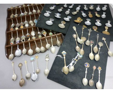 A large collection silver plate and enamel collectors spoons