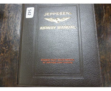 A leather bound Jepphesen Airway manual including maps of Europe, Canada and America