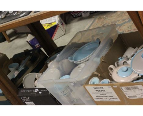 A large quantity of Poole twin tone dinner and teawares; 4 boxes