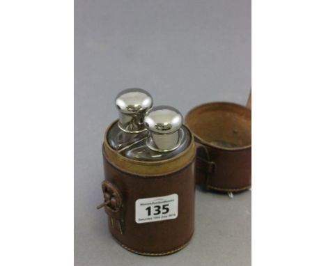 Vintage Set of Two Glass Hunting Flasks contained in a Circular Leather Holder