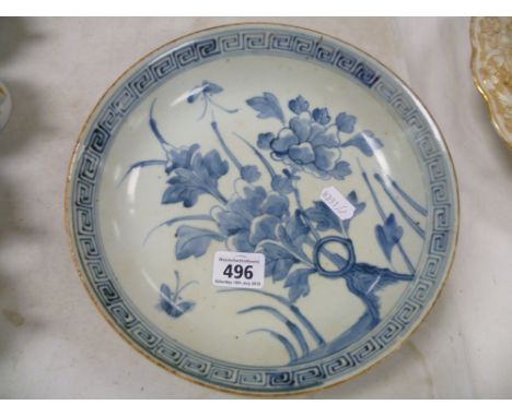 A Chinese porcelain blue and white plate; bearing pseudo character mark to base, decorated with central panel with key design