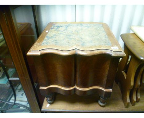 A Victorian walnut serpentine fronted commode