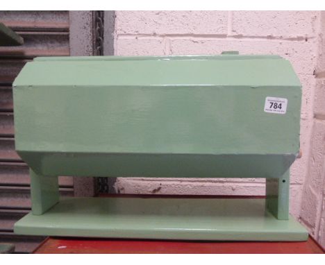 A painted tombola ticket machine