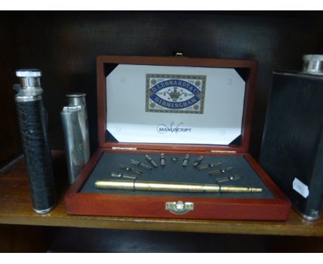 A cased D. Leonardt & Co Manuscript pen with a complete set of nibs together with three various hip flasks