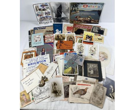 A box of assorted vintage ephemera to include: photographs, postcards, leaflets, tourist guides and silks. 