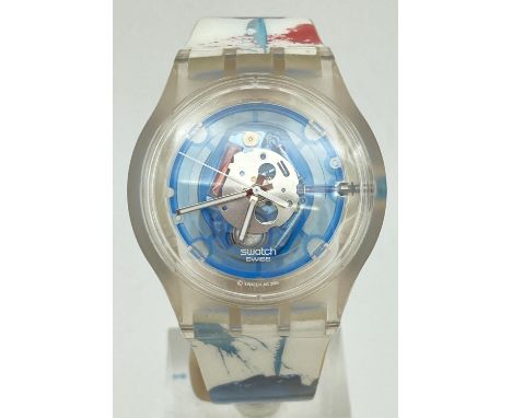 A limited edition Blue Man Group Swatch Watch SR626SW #614. With skeleton style face and colourful design plastic strap. 