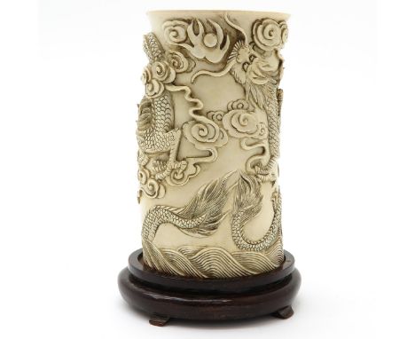 Carved, on wood base, 25 cm. tall including wood base.This item may not be shipped outside the European Union.