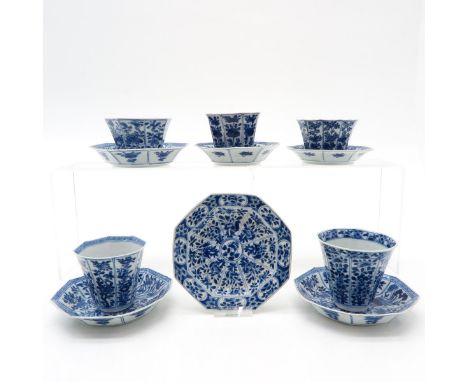 Including 5 cups and 6 saucers, blue and white decor, marked on the bottom, 12 cm. in diameter, chip and hairline.