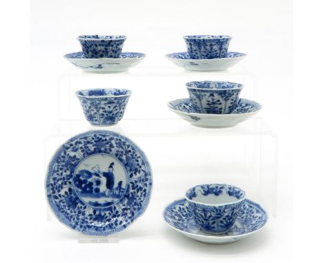Lot of 5 18th Century Cups and Saucers, blue and white decor, saucers are 11 cm. in diameter, chip.