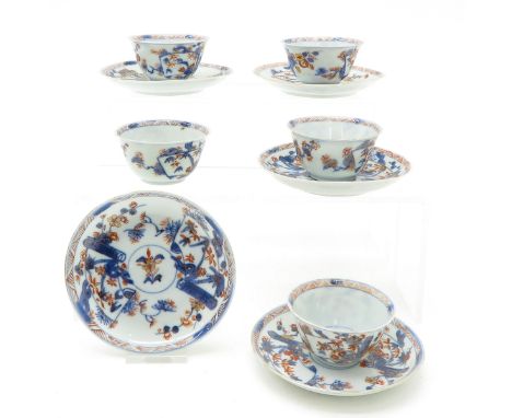 Including 5 cups and saucers, saucers are 11 cm. in diameter, chip and hairline.