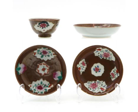Including 3 saucers and 1 cup, 12 cm. in diameter, chip and hairline. 