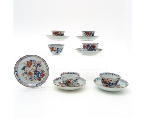 Imari decor, including 6 cups and 6 saucers, saucers are 11 cm. in diameter, chip and hairline.