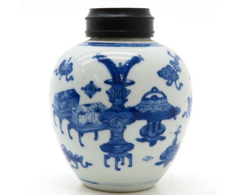 China, Kangxi Period, blue and white decor, “Hundreds Antiques” decor, marked wtih double ring, 16 cm. tall.