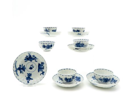 Blue and white decor, including 6 cups and 6 saucers, saucers are 11 cm. in diameter, chip and hairline.